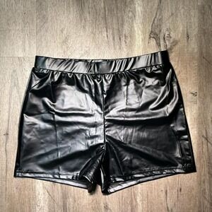 Black peplum bodycon dress with mesh back and zipper detail. Size: S